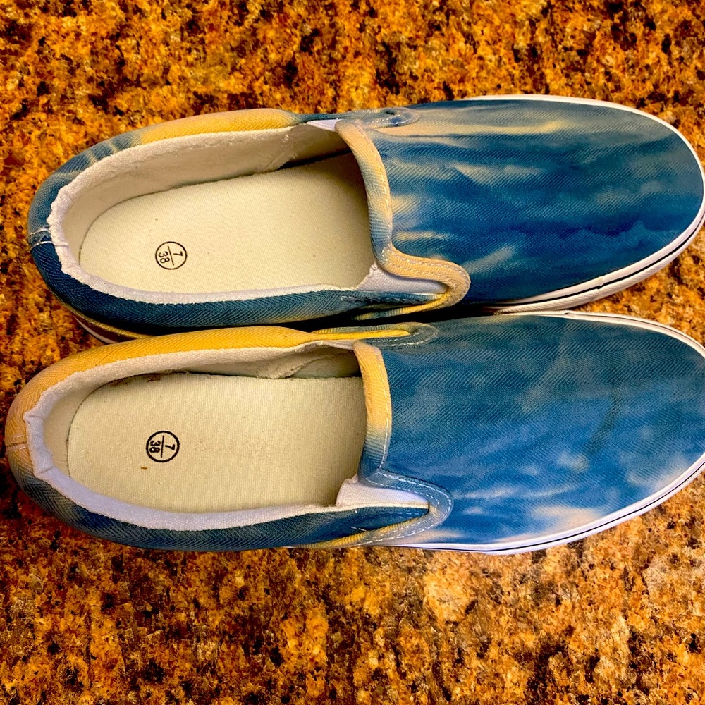 Tie-dye slip ons.
